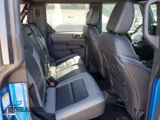 2024 Ford Bronco Big Bend z VIN 1FMDE7BH9RLB50114, wystawiony jako Copart lot #52157635 z przebiegiem 1 002 mil mil oraz Szkoda całkowita • Salvage title. Historia ofert i sprzedaży dostępna na DreamBid. Obrazek 12.