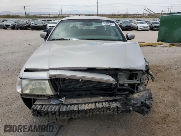 2004 Mercury Grand Marquis LS Premium z VIN 2MEFM75WX4X646351, wystawiony jako Copart lot #56770455 z przebiegiem 190 988 mil mil oraz Szkoda całkowita • Salvage title. Historia ofert i sprzedaży dostępna na DreamBid. Obrazek 5.