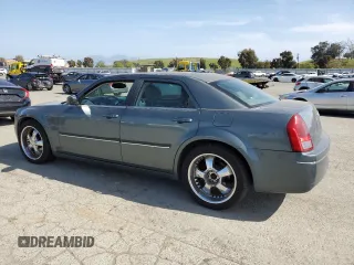 2005 Chrysler 300 with VIN 2C3AA53G65H123302, listed as a Copart auction lot 52449215 with 201,650 mi miles and Clean Title. Bid and sale history available at carsss.com. Image 2.