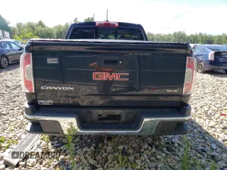 2015 GMC Canyon 4WD SLE with VIN 1GTG6BE34F1252557, listed as a Copart auction lot 61313294 with 16,084 mi miles and Salvage Title. Bid and sale history available at carsss.com. Image 6.