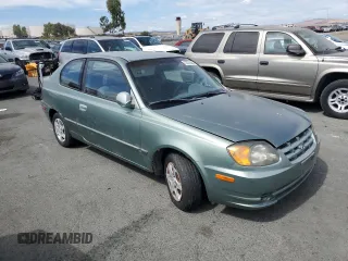 2003 Hyundai Accent GL with VIN KMHCG35C13U277732, listed as a Copart auction lot 72276634 with 135,176 mi miles and Salvage Title. Bid and sale history available at carsss.com. Image 4.
