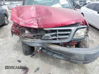 2002 Ford F-150 XL z VIN 1FTRX18W82NA64374, wystawiony jako IAAI lot #41812500 z przebiegiem 254 146 mil mil oraz . Historia ofert i sprzedaży dostępna na DreamBid. Obrazek 6.