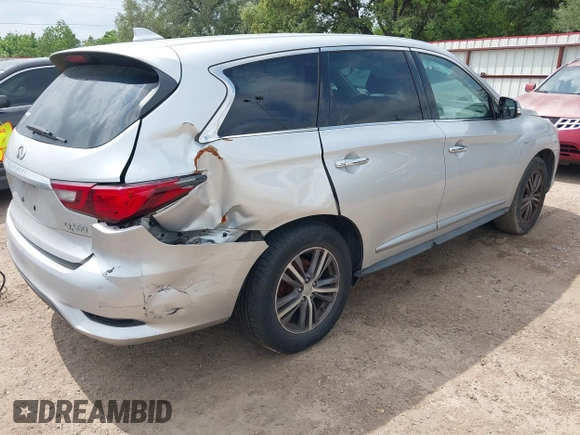 2019 Infiniti QX60 Luxe with VIN 5N1DL0MN0KC511333, listed as a IAAI auction lot 42070088 with 117,796 mi miles and . Bid and sale history available at DreamBid. Image 4.