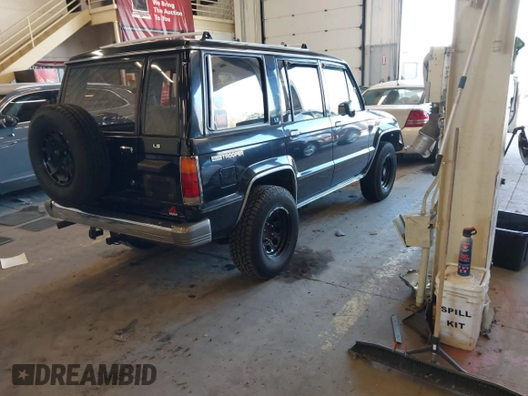 1991 Isuzu Trooper z VIN JACCH58R8M7902476, wystawiony jako IAAI lot #41893980 z przebiegiem 169 269 mil mil oraz . Historia ofert i sprzedaży dostępna na DreamBid. Obrazek 4.