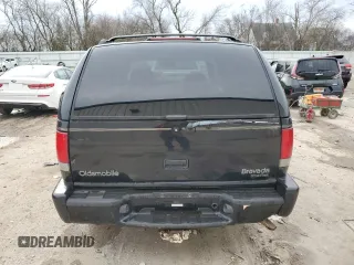 1998 Oldsmobile Bravada z VIN 1GHDT13W9W2730673, wystawiony jako Copart lot #80996524 z przebiegiem 126 418 mil mil oraz Nie do naprawy. Historia ofert i sprzedaży dostępna na DreamBid. Obrazek 6.