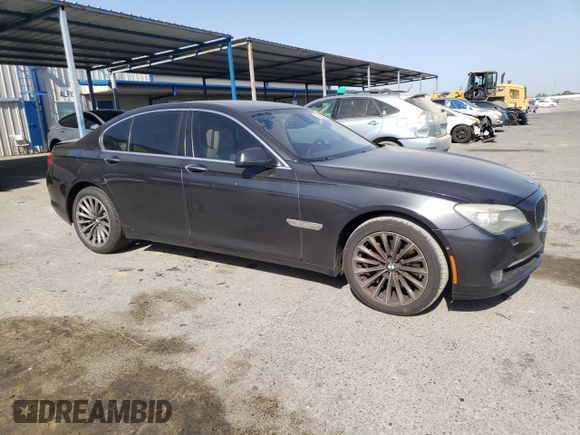 2012 BMW 7 Series 740i with VIN WBAKA4C54CC613419, listed as a Copart auction lot 54420885 with 104,006 mi miles and Salvage Title. Bid and sale history available at DreamBid. Image 4.