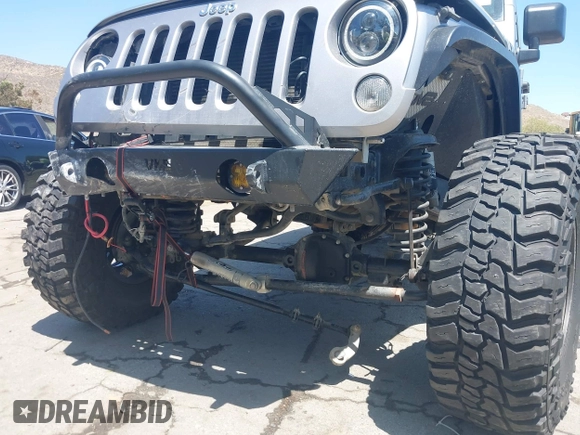 2018 Jeep Wrangler Unlimited Sport with VIN 1C4BJWDG4JL807265, listed as a IAAI auction lot 42520648 with 69,229 mi miles and . Bid and sale history available at DreamBid. Image 6.