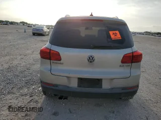 2012 Volkswagen Tiguan SEL with VIN WVGAV7AX2CW529098, listed as a Copart auction lot 53349565 with 128,603 mi miles and Salvage Title. Bid and sale history available at DreamBid. Image 6.