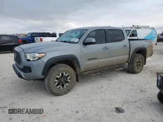 2020 Toyota Tacoma SR5 z VIN 3TMCZ5AN7LM334618, wystawiony jako Copart lot #48404515 z przebiegiem 80 144 mil mil oraz Czysty tytuł • Clean title. Historia ofert i sprzedaży dostępna na DreamBid. Obrazek 1.
