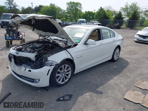 2013 BMW 5 Series 528i xDrive with VIN WBAXH5C54DD107317, listed as a IAAI auction lot 42244446 with 47,858 mi miles and . Bid and sale history available at DreamBid. Image 2.