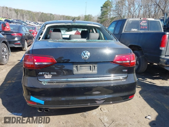 2017 Volkswagen Jetta SEL z VIN 3VWL17AJ5HM246543, wystawiony jako IAAI lot #41650614 z przebiegiem 112 168 mil mil oraz . Historia ofert i sprzedaży dostępna na DreamBid. Obrazek 16.