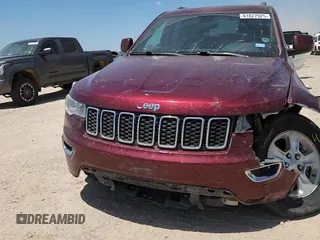 2017 Jeep Grand Cherokee Laredo with VIN 1C4RJFAG7HC693789, listed as a Copart auction lot 61827925 with 143,019 mi miles and Salvage title. Bid and sale history available at DreamBid. Image 14.