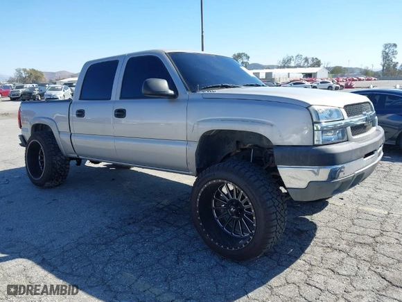 2005 Chevrolet Silverado 1500 LS with VIN 2GCEK13T351136405, listed as a IAAI auction lot 41684903 with 303,874 mi miles. Bid and sale history available at carsss.com. Image 1.