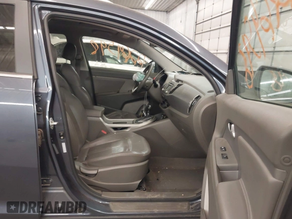 2011 Kia Sportage EX with VIN KNDPCCA27B7037886, listed as a IAAI auction lot 42264598 with 211,538 mi miles and . Bid and sale history available at DreamBid. Image 5.
