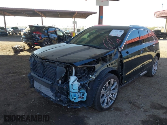 2023 Cadillac XT4 FWD Premium Luxury with VIN 1GYFZCR49PF173489, listed as a IAAI auction lot 41332451 with 10,227 mi miles and . Bid and sale history available at DreamBid. Image 2.