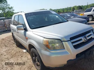 2006 Honda Pilot EX with VIN 2HKYF18466H505681, listed as a IAAI auction lot 42075259 with 214,449 mi miles and . Bid and sale history available at DreamBid. Image 1.