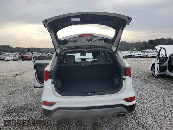 2018 Hyundai Santa Fe 2.4L z VIN 5NMZT3LB5JH092883, wystawiony jako Copart lot #48522495 z przebiegiem 69 745 mil mil oraz Szkoda całkowita • Salvage title. Historia ofert i sprzedaży dostępna na DreamBid. Obrazek 6.