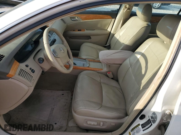 2006 Toyota Avalon XL z VIN 4T1BK36B66U102879, wystawiony jako Copart lot #41870725 z przebiegiem 307 922 mil mil oraz Szkoda całkowita • Salvage title. Historia ofert i sprzedaży dostępna na DreamBid. Obrazek 7.