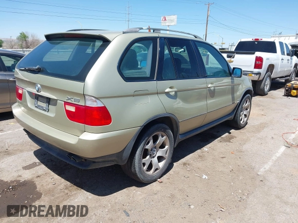 2000 BMW X5 with VIN WBAFB334XYLH02339, listed as a IAAI auction lot 42103940 with 115,355 mi miles. Bid and sale history available at carsss.com. Image 4.