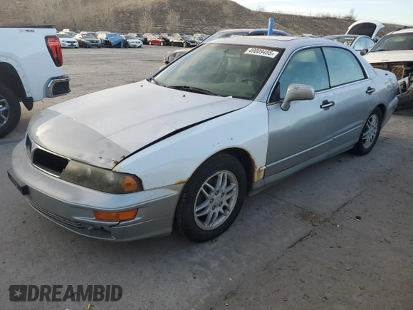 2000 Mitsubishi Diamante LS z VIN 6MMAP67P5YT006608, wystawiony jako Copart lot #49009455 z przebiegiem 241 503 mil mil oraz Tytuł czysty. Historia ofert i sprzedaży dostępna na DreamBid. Obrazek 1.