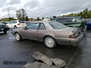 1987 Ford Thunderbird with VIN 1FABP6036HH185658, listed as a Copart auction lot 76998984 with 0 mi miles and Clean Title. Bid and sale history available at carsss.com. Image 2.
