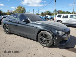 2015 BMW 4 Series 435i xDrive with VIN WBA4B3C59FGV48788, listed as a Copart auction lot 75408944 with 103,837 mi miles and Salvage Title. Bid and sale history available at DreamBid. Image 4.