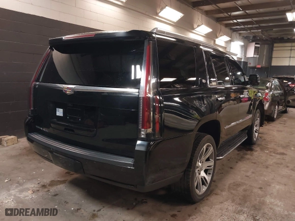 2018 Cadillac Escalade Luxury with VIN 1GYS4BKJ6JR162043, listed as a IAAI auction lot 39095150 with 68,407 mi miles. Bid and sale history available at carsss.com. Image 4.