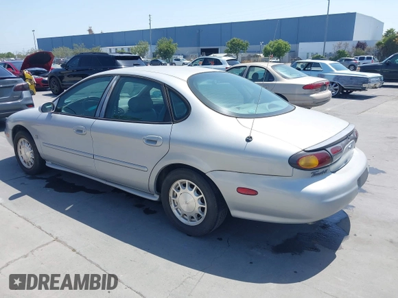 1996 Ford Taurus LX with VIN 1FALP53S5TG199843, listed as a IAAI auction lot 42430761 with 95,984 mi miles and . Bid and sale history available at DreamBid. Image 3.