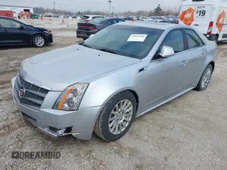 2011 Cadillac CTS Luxury z VIN 1G6DG5EY9B0105800, wystawiony jako IAAI lot #42014906 z przebiegiem 135 081 mil mil oraz . Historia ofert i sprzedaży dostępna na DreamBid. Obrazek 2.