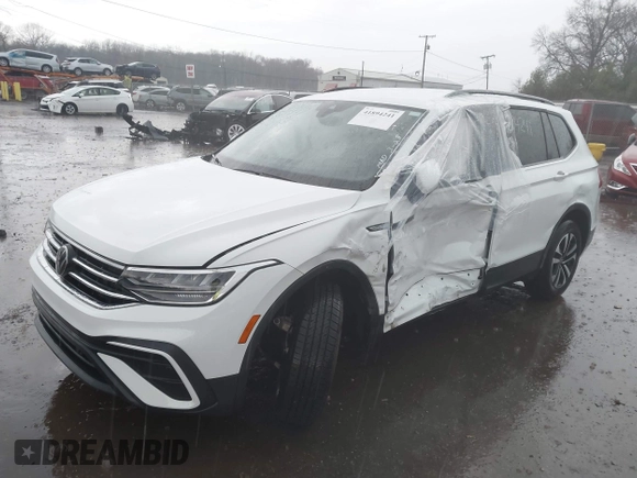 2024 Volkswagen Tiguan S with VIN 3VVFB7AX2RM092023, listed as a IAAI auction lot 41894241 with 10,395 mi miles and . Bid and sale history available at DreamBid. Image 6.