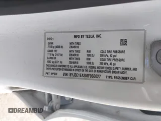 2021 Tesla Model 3 Standard Range Plus z VIN 5YJ3E1EA3MF060027, wystawiony jako IAAI lot #42319107 z przebiegiem 44 339 mil mil oraz . Historia ofert i sprzedaży dostępna na DreamBid. Obrazek 9.