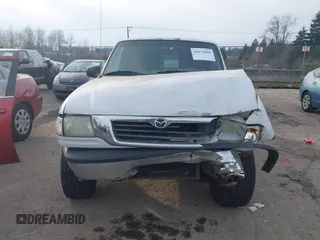 2000 Mazda B-Series 2WD Truck SX with VIN 4F4YR12C4YTM29858, listed as a IAAI auction lot 41473810 with 261,518 mi miles. Bid and sale history available at carsss.com. Image 6.