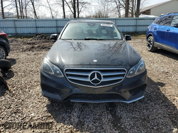 2014 Mercedes-Benz E 350 Luxury with VIN WDDHF8JB3EA910524, listed as a Copart auction lot 50233655 with 209,262 mi miles and Salvage Title. Bid and sale history available at DreamBid. Image 5.