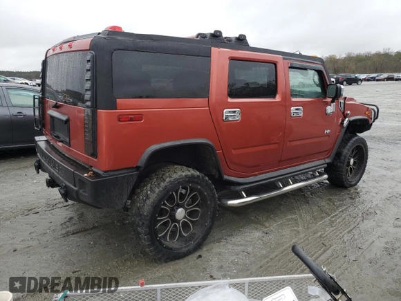 2003 Hummer H2 with VIN 5GRGN23U33H136931, listed as a Copart auction lot 80671794 with 127,137 mi miles and Salvage Title. Bid and sale history available at carsss.com. Image 3.