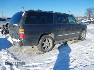 2004 Chevrolet Suburban LS with VIN 3GNEC16Z94G319009, listed as a IAAI auction lot 41531390 with 259,957 mi miles. Bid and sale history available at carsss.com. Image 4.