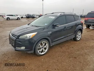 2014 Ford Escape Titanium с VIN 1FMCU0J90EUA04690, выставлен на аукционе Copart как лот 58421735 с пробегом 200 743 миль миль и Чистый • Clean title. История ставок и продаж доступна на DreamBid. Изображение 1.