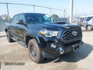 2022 Toyota Tacoma SR5 z VIN 3TMBZ5DN6NM034630, wystawiony jako IAAI lot #42733932 z przebiegiem 43 309 mil mil oraz . Historia ofert i sprzedaży dostępna na DreamBid. Obrazek 1.