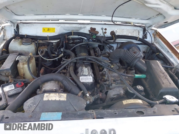 1994 Jeep Cherokee Sport with VIN 1J4FT68S7RL160652, listed as a IAAI auction lot 41992392 with 158,122 mi miles and . Bid and sale history available at DreamBid. Image 10.