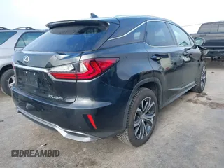 2016 Lexus RX 450h with VIN 2T2BGMCA3GC003065, listed as a IAAI auction lot 41043087 with 89,077 mi miles and . Bid and sale history available at DreamBid. Image 4.