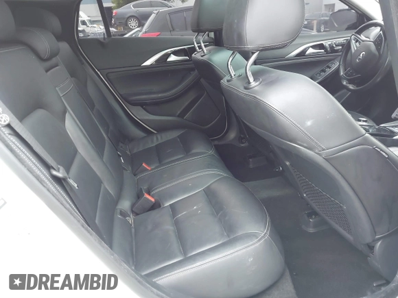 2018 Infiniti QX30 Premium with VIN SJKCH5CR8JA048030, listed as a IAAI auction lot 41097383 with 131,820 mi miles and . Bid and sale history available at DreamBid. Image 8.