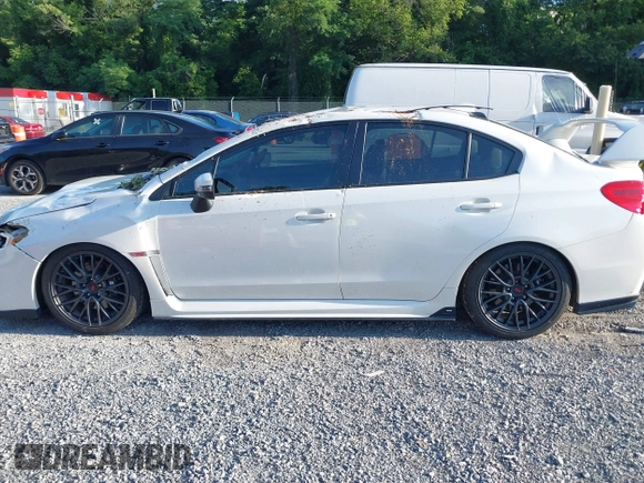 2015 Subaru WRX STI z VIN JF1VA2P65F9824661, wystawiony jako IAAI lot #42623315 z przebiegiem 69 103 mil mil oraz . Historia ofert i sprzedaży dostępna na DreamBid. Obrazek 14.