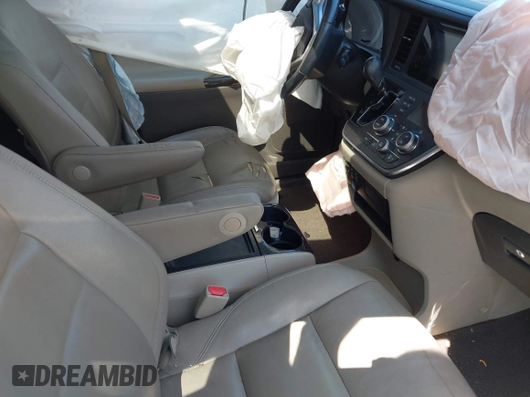 2015 Toyota Sienna XLE with VIN 5TDYK3DC0FS649998, listed as a IAAI auction lot 42531828 with 111,539 mi miles and . Bid and sale history available at DreamBid. Image 5.