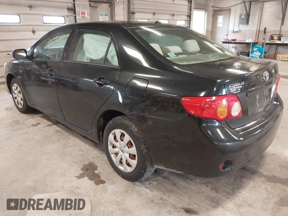 2009 Toyota Corolla with VIN 1NXBU40E29Z133733, listed as a IAAI auction lot 42093904 with 229,509 mi miles. Bid and sale history available at carsss.com. Image 3.