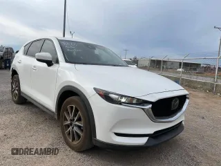 2018 Mazda CX-5 Touring with VIN JM3KFACM6J0303949, listed as a Copart auction lot 49524985 with 131,894 mi miles and Clean Title. Bid and sale history available at carsss.com. Image 1.