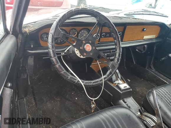 1979 FIAT 124 Spider z VIN 124CS20146682, wystawiony jako Copart lot #73923954 z przebiegiem 83 258 mil mil oraz Szkoda całkowita • Salvage title. Historia ofert i sprzedaży dostępna na DreamBid. Obrazek 8.