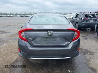 2019 Honda Civic LX with VIN 19XFC2F68KE007409, listed as a IAAI auction lot 41887406 with 57,147 mi miles and . Bid and sale history available at DreamBid. Image 16.