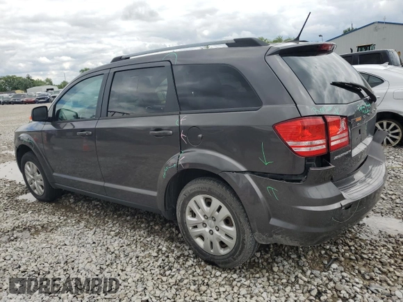 2017 Dodge Journey SE z VIN 3C4PDCAB1HT709104, wystawiony jako Copart lot #57132935 z przebiegiem 89 024 mil mil oraz Szkoda całkowita • Salvage title. Historia ofert i sprzedaży dostępna na DreamBid. Obrazek 2.