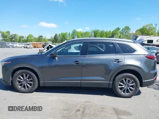 2021 Mazda CX-9 Touring with VIN JM3TCACY7M0503484, listed as a IAAI auction lot 42013262 with 63,777 mi miles and . Bid and sale history available at DreamBid. Image 15.
