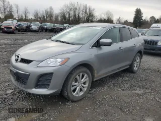 2010 Mazda CX-7 Touring with VIN JM3ER4WL9A0306739, listed as a Copart auction lot 86774134 with 111,269 mi miles and Salvage Title. Bid and sale history available at carsss.com. Image 1.