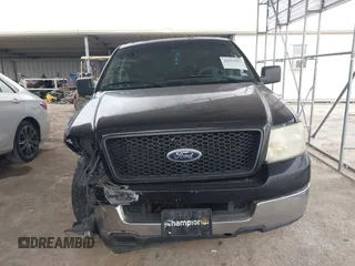 2005 Ford F-150 XLT with VIN 1FTRW12W35FB45809, listed as a IAAI auction lot 41611912 with 253,241 mi miles. Bid and sale history available at carsss.com. Image 12.